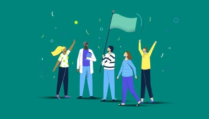 Group of people holding a flag